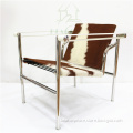 LC1 Le Corbusier vintage lounge chair in cowhide in living room